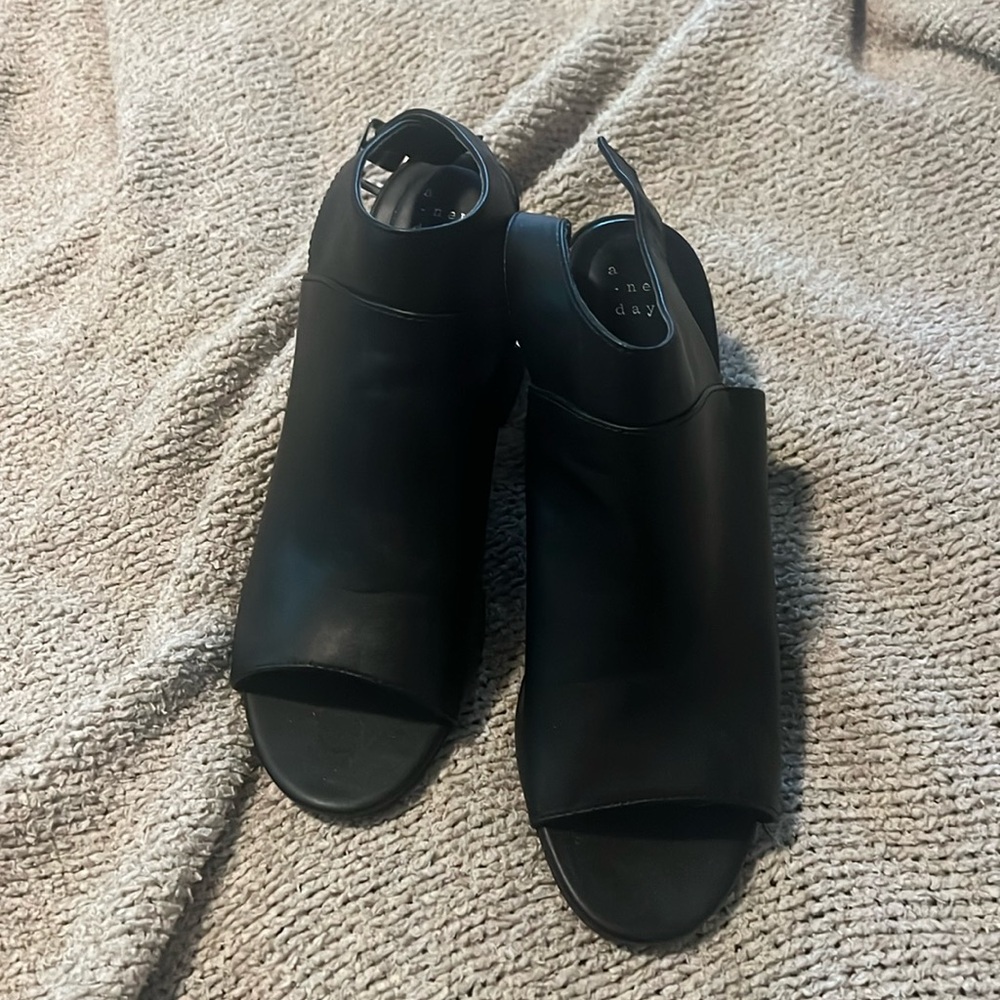 Black peep toes heels - a new day, leather like material